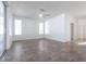 Bright living room features tile flooring, neutral walls, and large windows offering plenty of natural light at 5017 46Th W St, Bradenton, FL 34210