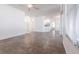 Spacious living room features tile flooring, neutral walls, and a ceiling fan, perfect for relaxing or entertaining at 5017 46Th W St, Bradenton, FL 34210