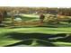Picturesque view of the lush green golf course and sand traps in this community at 5119 Summit View Dr, Brooksville, FL 34601