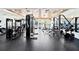 Well-equipped gym with modern machines, weights, and rubber flooring for a complete fitness experience at 5119 Summit View Dr, Brooksville, FL 34601