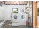 Bright laundry room with white washer and dryer set at 5821 52Nd N Ave, Kenneth City, FL 33709