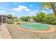 Backyard with a lawn, pool, and shed at 5821 52Nd N Ave, Kenneth City, FL 33709