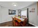 Dining room with dark wood floors, table and chairs at 602 Hillpoint Way, Brandon, FL 33510