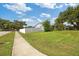 Spacious front yard and home along a sidewalk at 602 Hillpoint Way, Brandon, FL 33510