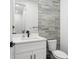 Modern bathroom with quartz countertop, new sink and modern backsplash at 6206 64Th N Way, Pinellas Park, FL 33781