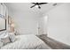 This bedroom boasts sleek floors, a fan, and an abundance of natural light at 6206 64Th N Way, Pinellas Park, FL 33781