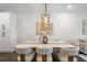 Dining room with modern table, chairs, and light fixture at 6206 64Th N Way, Pinellas Park, FL 33781