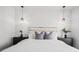 Bedroom featuring a bright aesthetic, two hanging lights and plant decor at 6206 64Th N Way, Pinellas Park, FL 33781