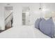 Bright bedroom with a view to the staircase and the walk-in closet at 6206 64Th N Way, Pinellas Park, FL 33781