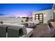 Inviting outdoor patio with comfortable seating, a large screen, and great evening ambiance at 6206 64Th N Way, Pinellas Park, FL 33781