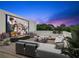 Outdoor patio showcasing a large screen and ample seating, perfect for entertaining at 6206 64Th N Way, Pinellas Park, FL 33781