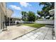Expansive backyard with a covered patio and an outdoor bar area, ideal for entertaining and relaxation at 6212 S Adelia Ave, Tampa, FL 33616