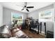 Functional home office with a desk, comfortable seating, and ample natural light at 6212 S Adelia Ave, Tampa, FL 33616