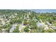 Aerial view showcases the home's location in a lush, tree-lined neighborhood with access to the bay at 650 63Rd S Ave, St Petersburg, FL 33705