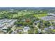 Aerial view of the neighborhood with golf courses and a racetrack nearby at 6505 Cedar Ne St, St Petersburg, FL 33702