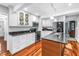 Modern kitchen featuring granite countertops, stainless steel appliances, and ample cabinet space at 6505 Cedar Ne St, St Petersburg, FL 33702