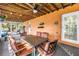Spacious covered patio with a dining set, ideal for outdoor entertaining and relaxation at 6505 Cedar Ne St, St Petersburg, FL 33702