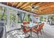 Inviting screened porch with ample seating and a ceiling fan, perfect for outdoor relaxation at 6505 Cedar Ne St, St Petersburg, FL 33702