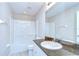 Bathroom featuring a granite vanity, toilet, and shower/tub combo at 7077 Woodchase Glen Dr, Riverview, FL 33578