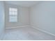 Bedroom featuring neutral walls, carpeted floors, and a window at 7077 Woodchase Glen Dr, Riverview, FL 33578
