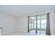 Bright dining room featuring tile floors and sliding glass doors that provide lots of natural light at 7077 Woodchase Glen Dr, Riverview, FL 33578