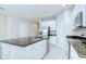 Beautiful kitchen with a granite island and stainless steel appliances at 7077 Woodchase Glen Dr, Riverview, FL 33578