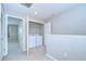 Upstairs laundry area with washer and dryer hookups in a closet space at 7077 Woodchase Glen Dr, Riverview, FL 33578