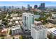 Aerial view of modern high-rise condo building and surrounding cityscape at 777 3Rd N Ave # 1406, St Petersburg, FL 33701