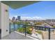Balcony view overlooking a serene lake and the vibrant cityscape at 777 3Rd N Ave # 1406, St Petersburg, FL 33701
