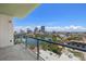 Balcony view overlooking the city and lake with glass railing and tile flooring at 777 3Rd N Ave # 1406, St Petersburg, FL 33701