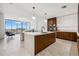 Contemporary kitchen with a large center island, pendant lighting, and stainless steel appliances at 777 3Rd N Ave # 1406, St Petersburg, FL 33701