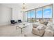 Bright living room with floor-to-ceiling windows and modern furnishings at 777 3Rd N Ave # 1406, St Petersburg, FL 33701