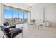 Bright living room with floor-to-ceiling windows offering city views at 777 3Rd N Ave # 1406, St Petersburg, FL 33701