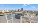 Stunning rooftop terrace featuring city views, comfortable seating, and a modern fire pit for relaxing evenings at 777 3Rd N Ave # 1406, St Petersburg, FL 33701