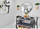 Cozy dining area with modern table setting, stylish decor, and open layout at 8010 W Hiawatha St, Tampa, FL 33615
