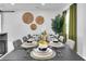 Formal dining room with a large table, decorative accents, and serene ambiance at 8010 W Hiawatha St, Tampa, FL 33615