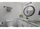 Modern bathroom with a stylish sink and vanity, marble accents, and updated fixtures at 8718 Tahiti Ln, Tampa, FL 33615