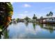 Picturesque canal view dotted with private docks, capturing the allure of waterfront residences at 8718 Tahiti Ln, Tampa, FL 33615