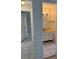 Bathroom featuring white vanity with tile flooring at 8801 Orange Blossom Dr, Seminole, FL 33772