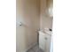 Bathroom featuring white vanity with sink and a white towel rack at 8801 Orange Blossom Dr, Seminole, FL 33772