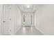 Bright foyer with tiled floors, neutral walls, and white trim at 9073 Fruitland Ave, Englewood, FL 34224