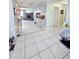 Open-concept living area showcasing an easy flow and tile flooring at 9171 Vicksburg Rd, Spring Hill, FL 34608