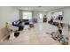 Spacious living room with tile floors and abundant natural light at 9171 Vicksburg Rd, Spring Hill, FL 34608