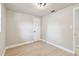 Neutral bedroom with fresh paint and closet and a neutral color palette at 9312 N Tampa St, Tampa, FL 33612