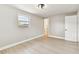 Bright bedroom featuring a window, closet, and fresh paint, with a neutral color palette at 9312 N Tampa St, Tampa, FL 33612