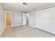 Clean, bright bedroom with closet, fresh paint, and attached bathroom with tiled shower at 9312 N Tampa St, Tampa, FL 33612