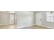Bright and open room with neutral color palette and modern flooring at 9312 N Tampa St, Tampa, FL 33612