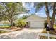 Charming single-Gathering home with a two-car garage and well-maintained landscaping at 9807 Stephenson Dr, New Port Richey, FL 34655