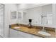 Bright bathroom featuring a double vanity with granite countertops and tile floors at 10361 Lightner Bridge Dr, Tampa, FL 33626