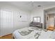 Bedroom featuring a ceiling fan and a dresser with light wood finish at 10361 Lightner Bridge Dr, Tampa, FL 33626